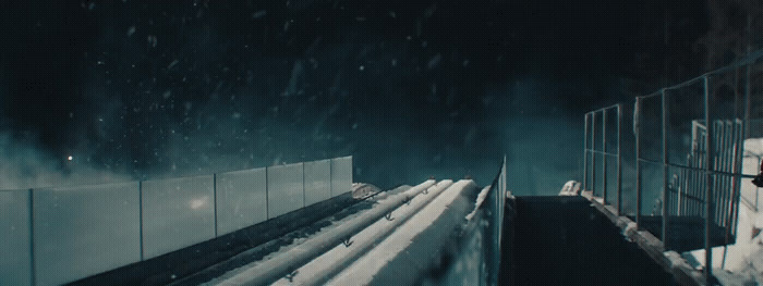 a person walking up a ramp in the snow