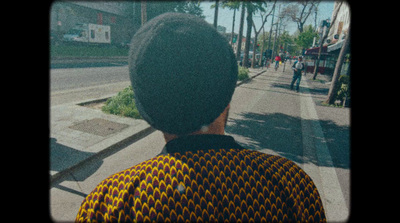 a person standing on the side of a road