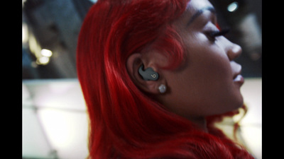 a close up of a person with red hair