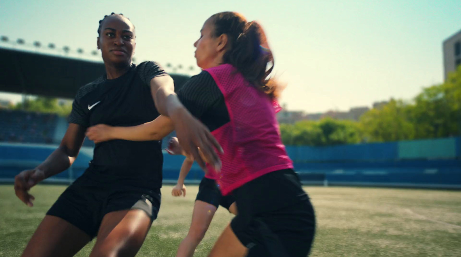 a man and a woman playing a game of frisbee