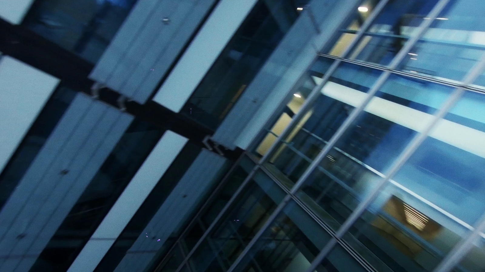 a view of a building through a glass window