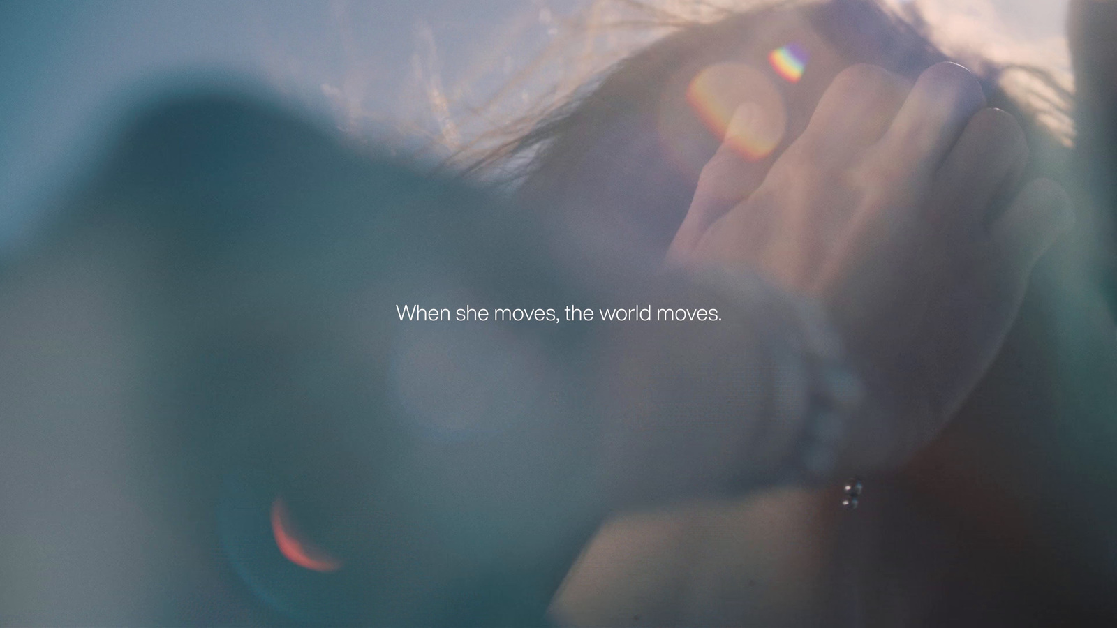 a blurry photo of a woman talking on a cell phone