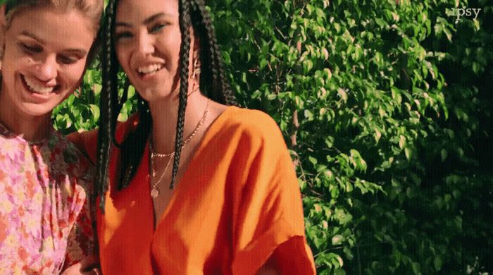 two young women standing next to each other