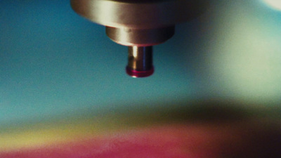 a close up of a metal object with a blurry background