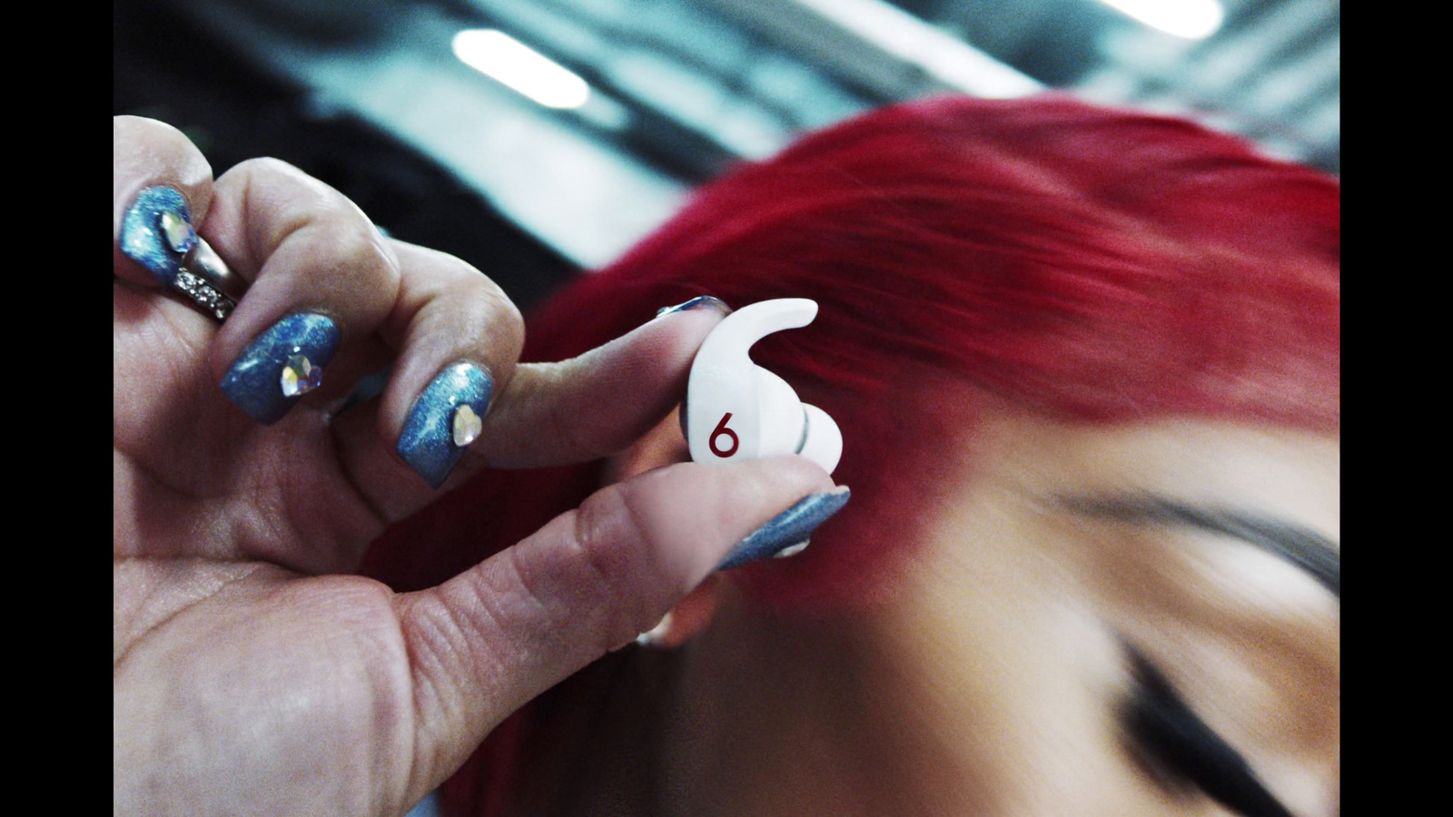 a close up of a person with red hair