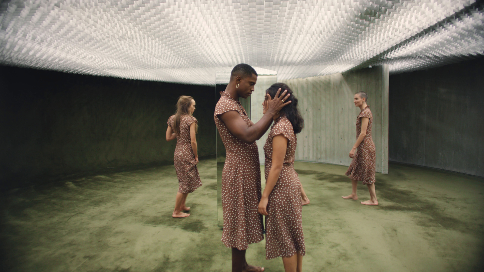 a group of people standing in a room