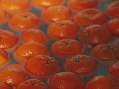 a bunch of oranges that are in a bowl