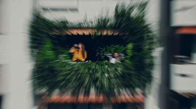 a blurry photo of a couple in a window