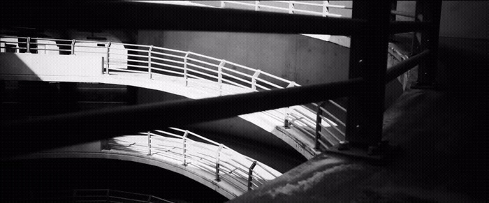 a black and white photo of a staircase