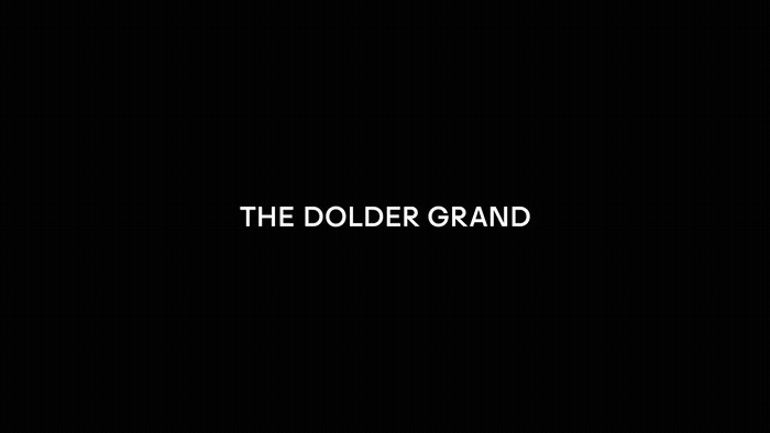 a black background with the words the dolder grand