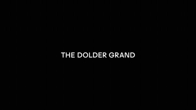 a black background with the words the dolder grand