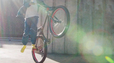 a person jumping a bike in the air