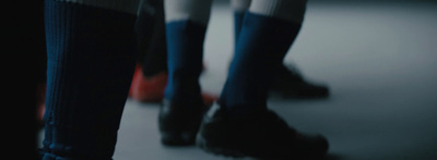 a close up of a person's legs wearing socks and socks