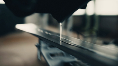 a close up of a metal object with a blurry background