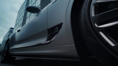 a close up of a car tire on a city street