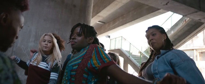 a group of people standing next to each other