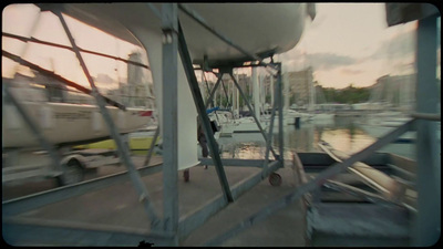 a blurry photo of a boat docked at a marina