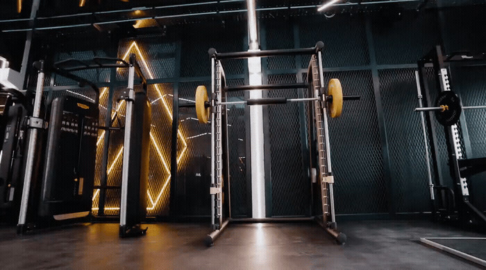 a gym with a lot of equipment in it