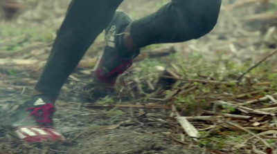 a close up of a person walking on a trail