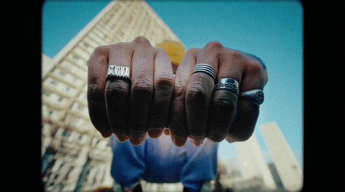 a man with two rings on his fingers