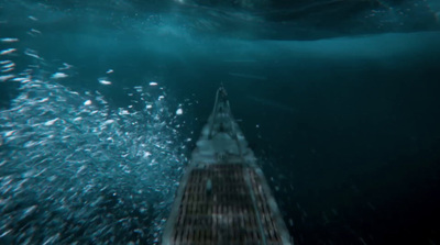 a boat floating in the ocean with a lot of water around it