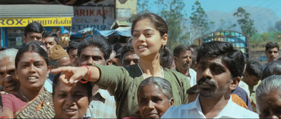 a woman pointing at a crowd of people