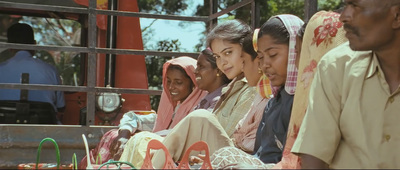 a group of people sitting next to each other