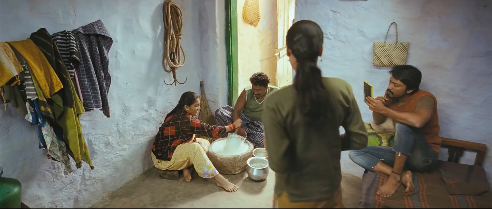 a group of people sitting around a room