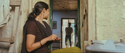 a woman standing in front of a doorway