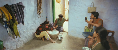 a group of people sitting in a room next to each other