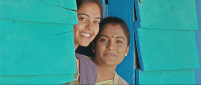 a couple of women standing next to each other