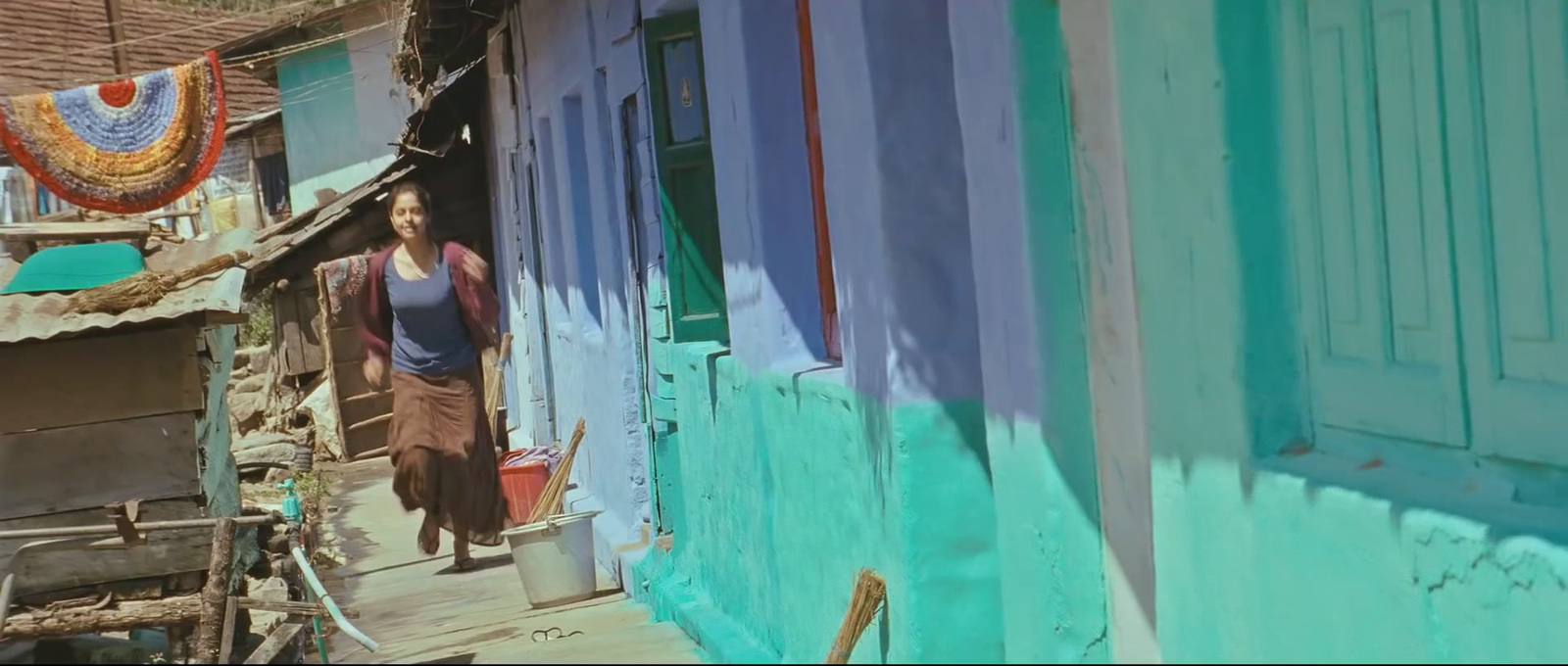 a woman standing in a doorway of a house