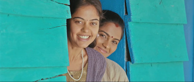 a couple of women standing next to each other