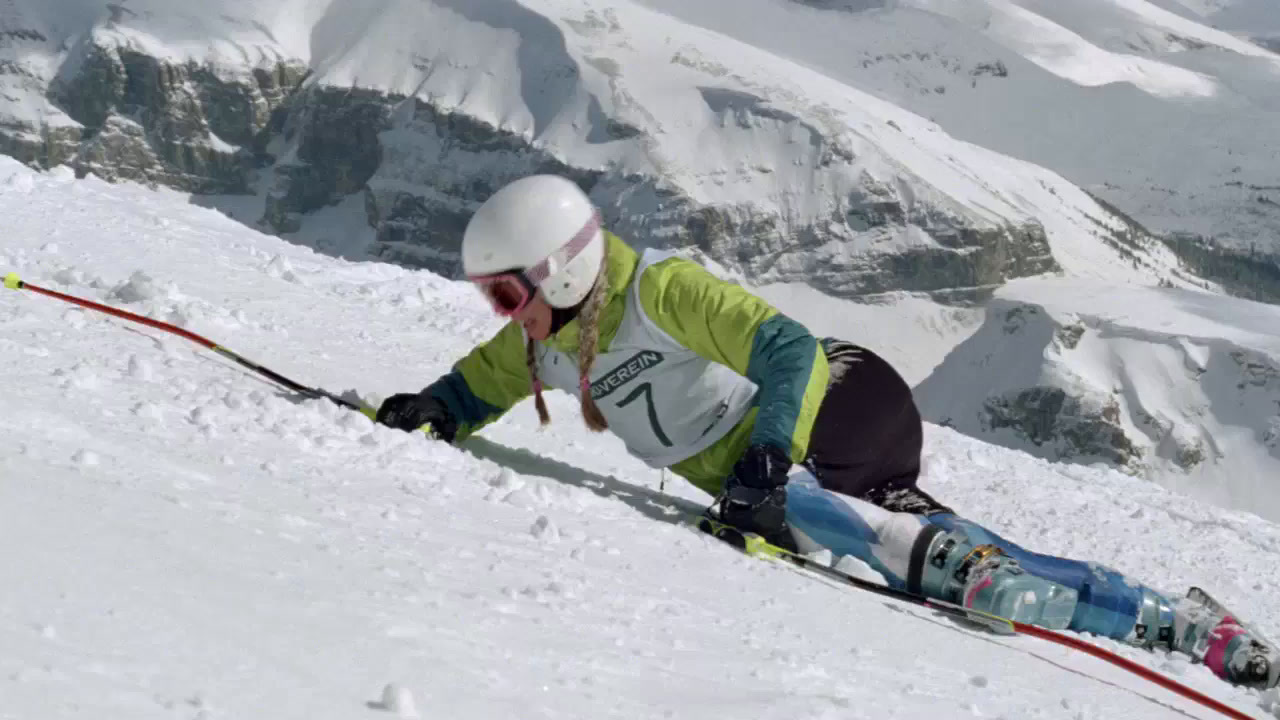 a person on some skis in the snow