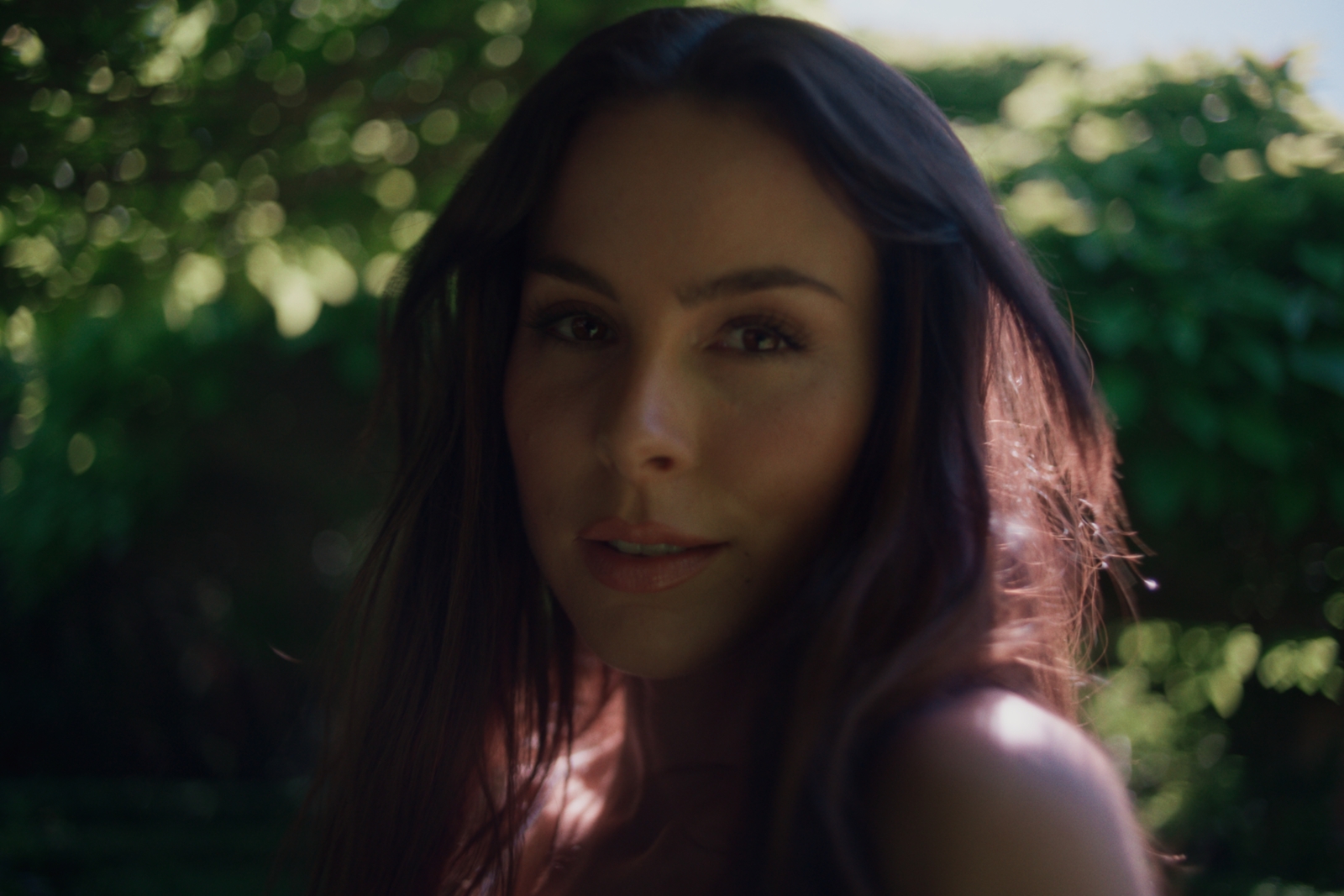 a close up of a person with long hair