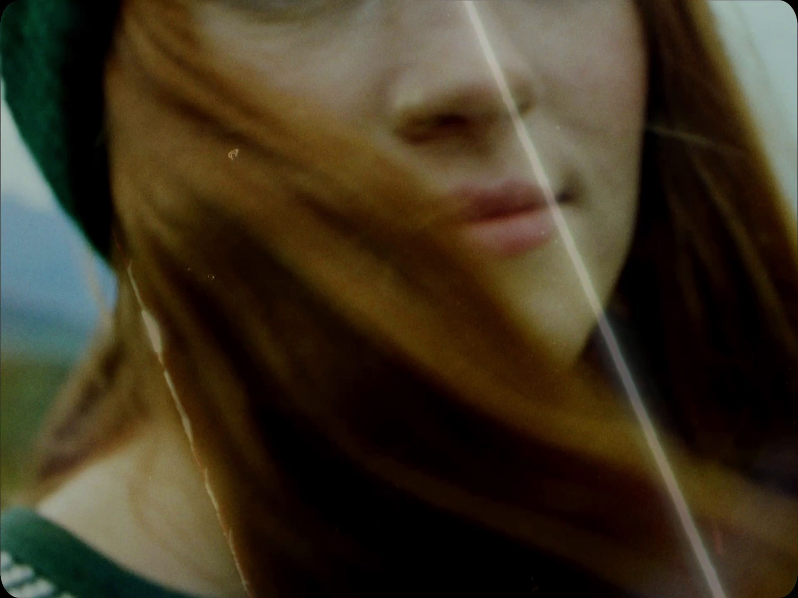 a close up of a person with long hair