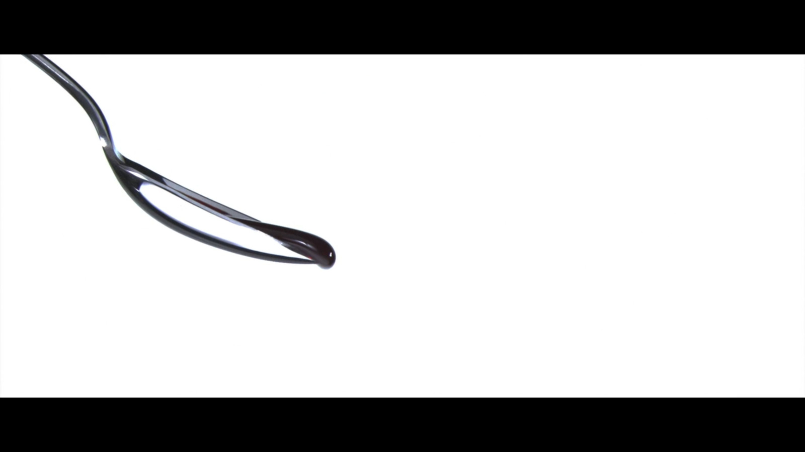 a close up of a pair of scissors on a white background