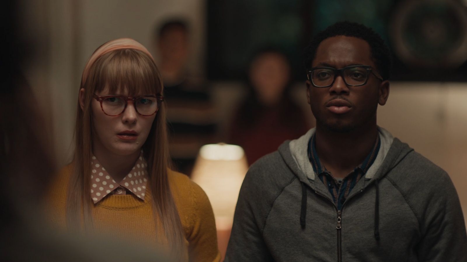 a man and a woman standing next to each other