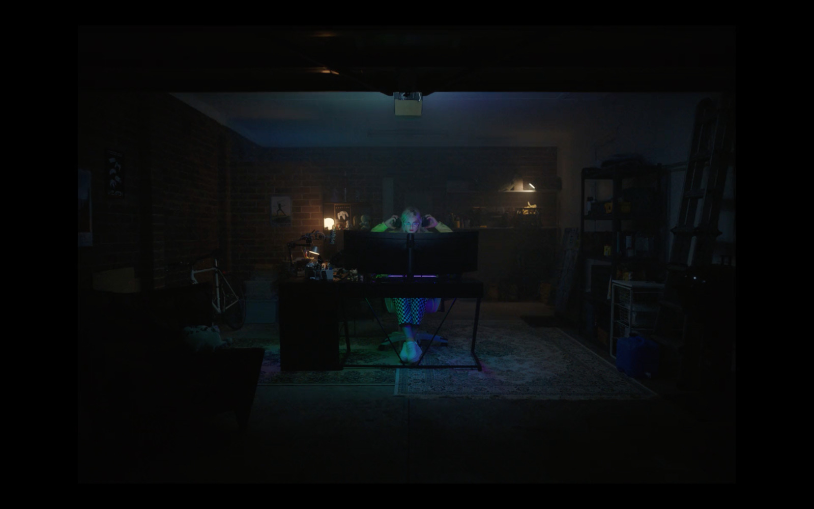 a dark room with a piano in it