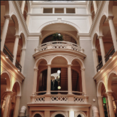 the inside of a building with a balcony and balconies