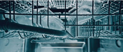 the inside of a dishwasher with water in it