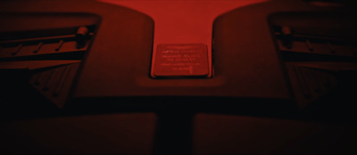 a close up of a red object on a table