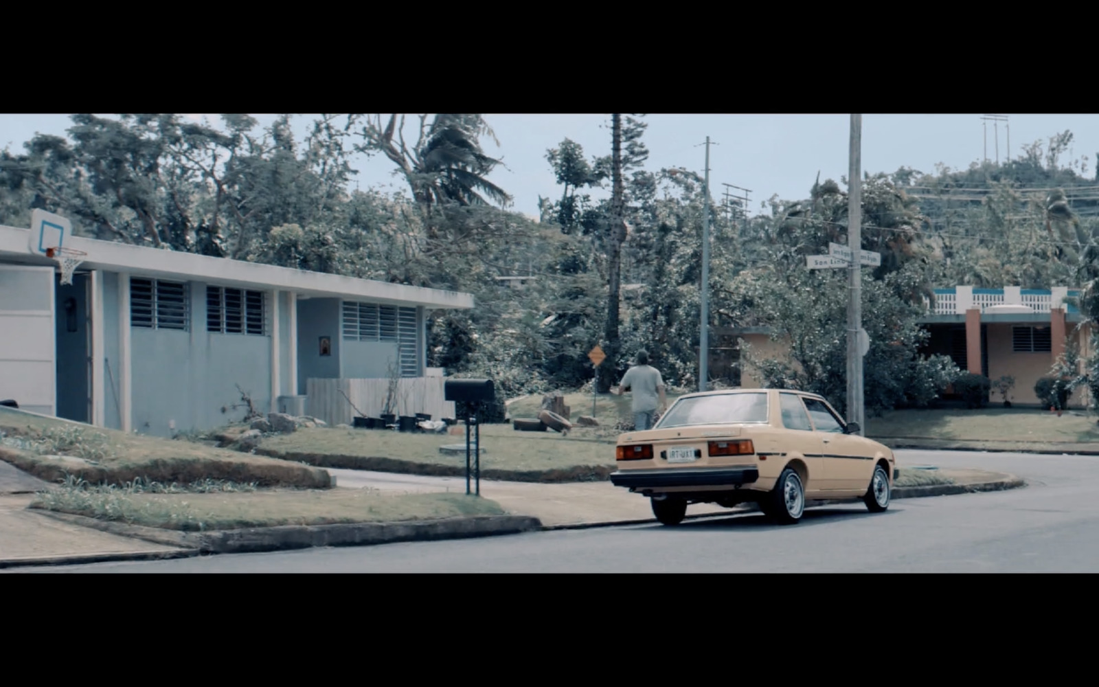 a car is parked on the side of the road