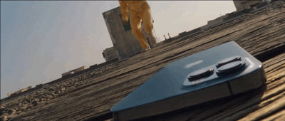 a cell phone sitting on top of a wooden table