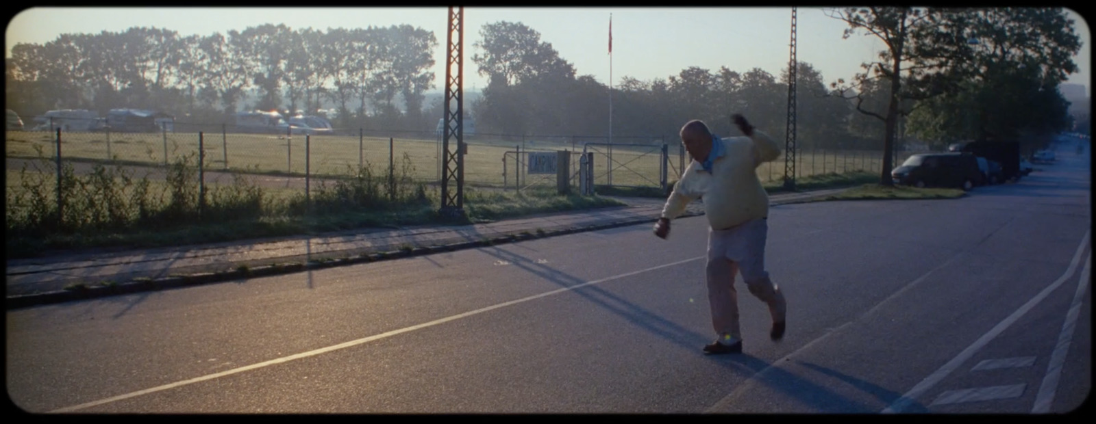 a person on a tennis court with a racket