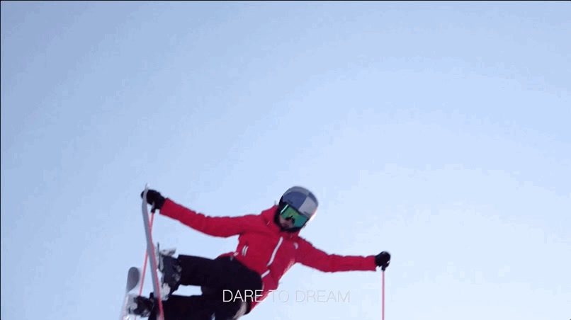 a person jumping a snow board in the air