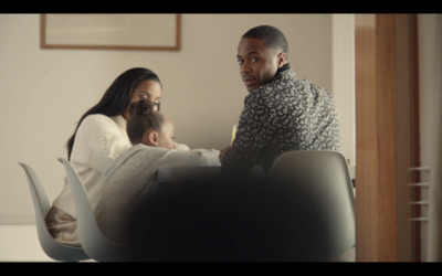 a man and a woman sitting at a table