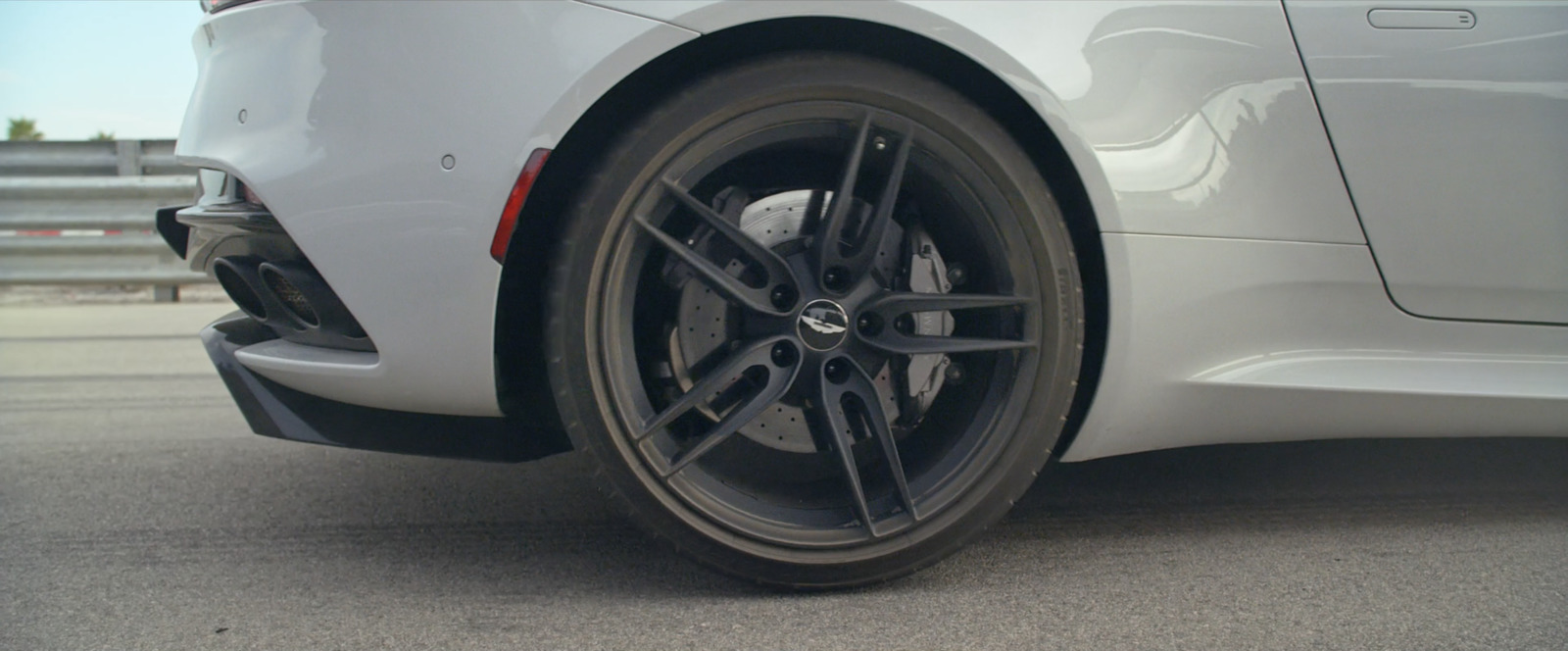 a close up of a car tire on a road