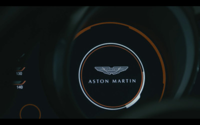 a close up of a steering wheel with a logo on it