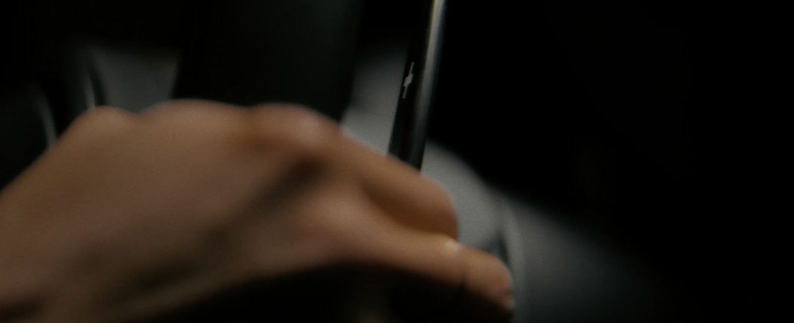 a close up of a person's hand on a cell phone